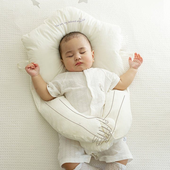 Snuggish Newborn Anti Roll Pillow