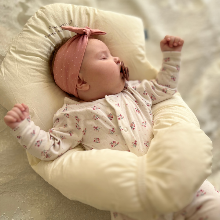 Snuggish Newborn Anti Roll Pillow