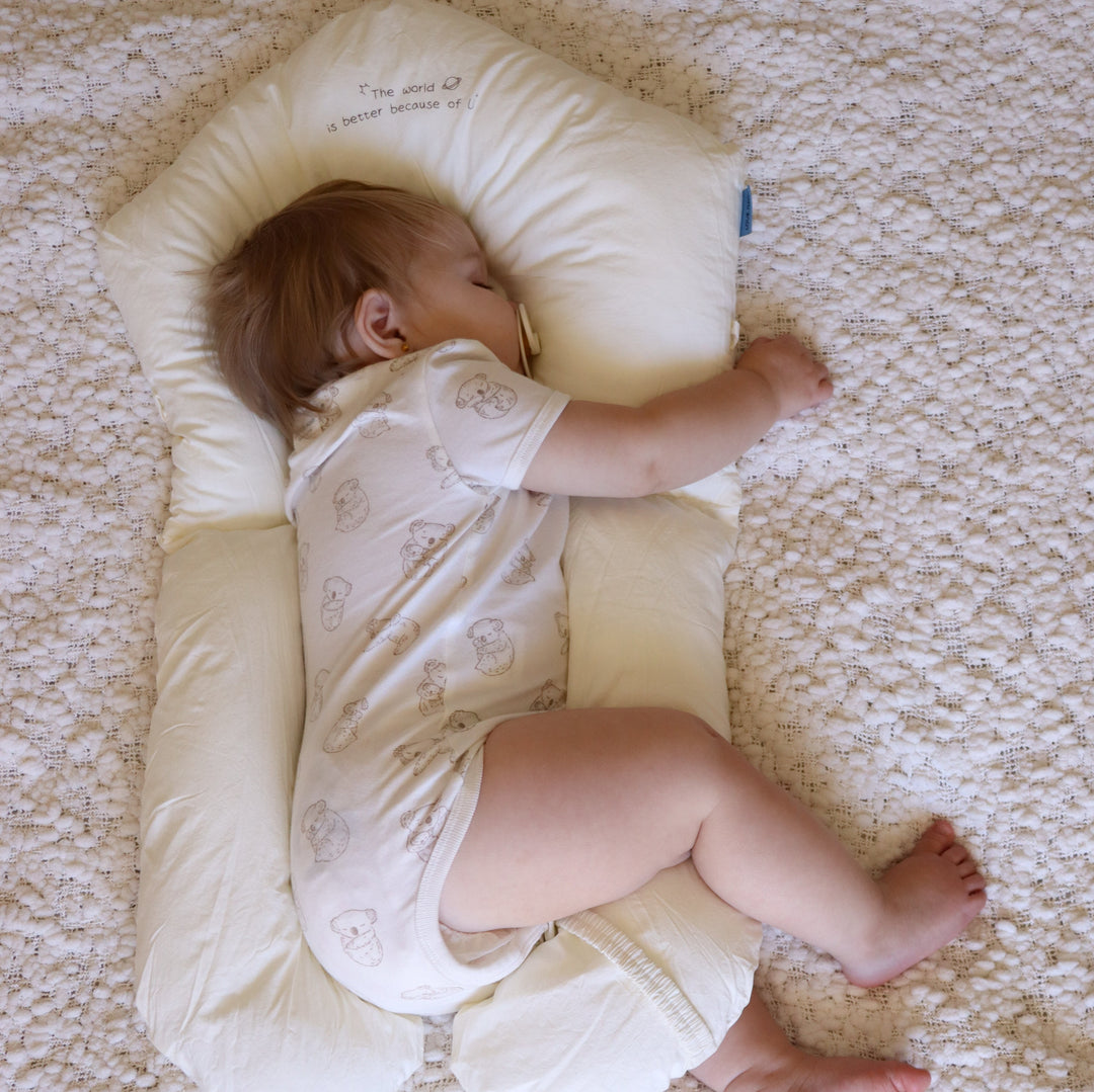 Snuggish Newborn Anti Roll Pillow