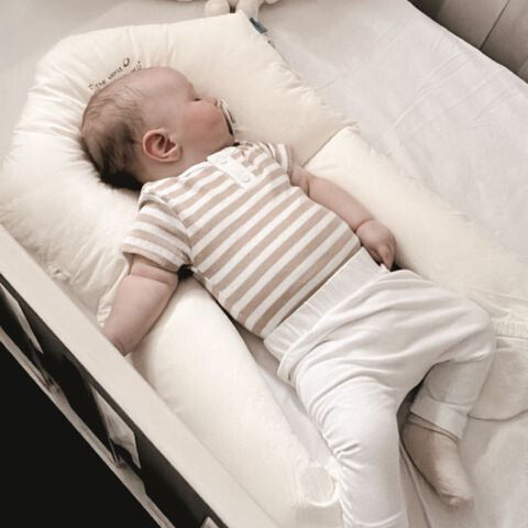 Snuggish Newborn Anti Roll Pillow